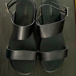 Black leather and wood torrid platforms